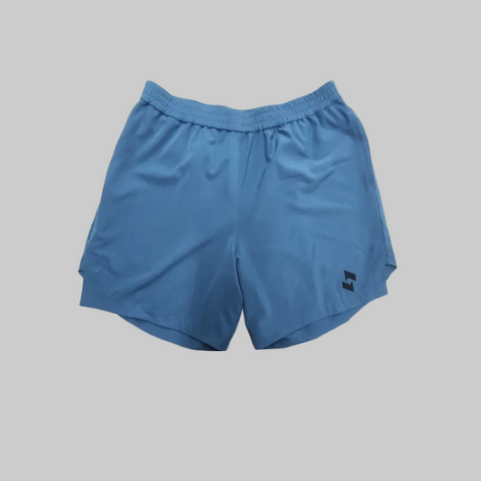 Blue athletic shorts with an elastic waistband and a small sopro black logo on the lower left leg, shown against a plain white background.