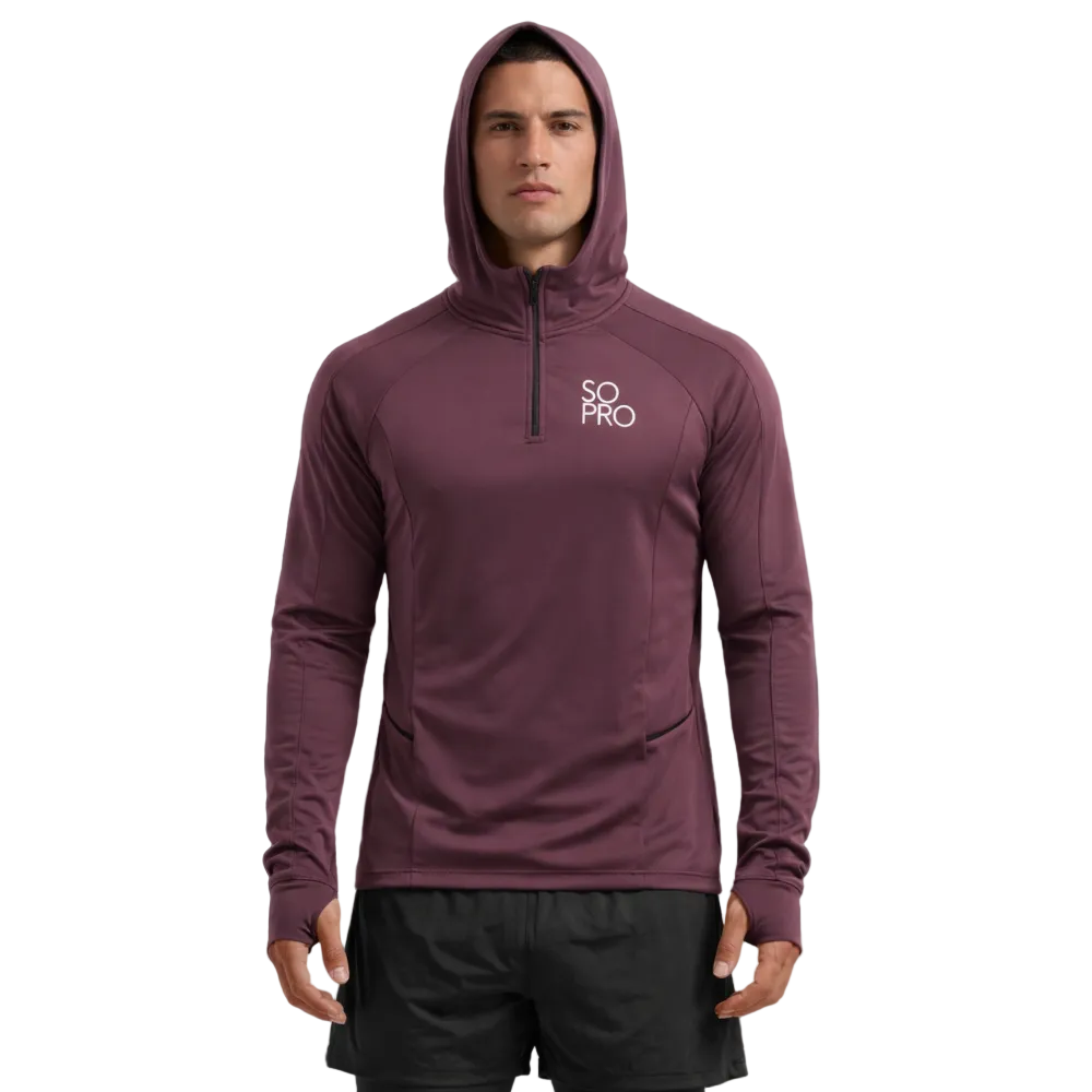 Man wearing a maroon hoodie with 'SO PRO' logo on a light grey  background